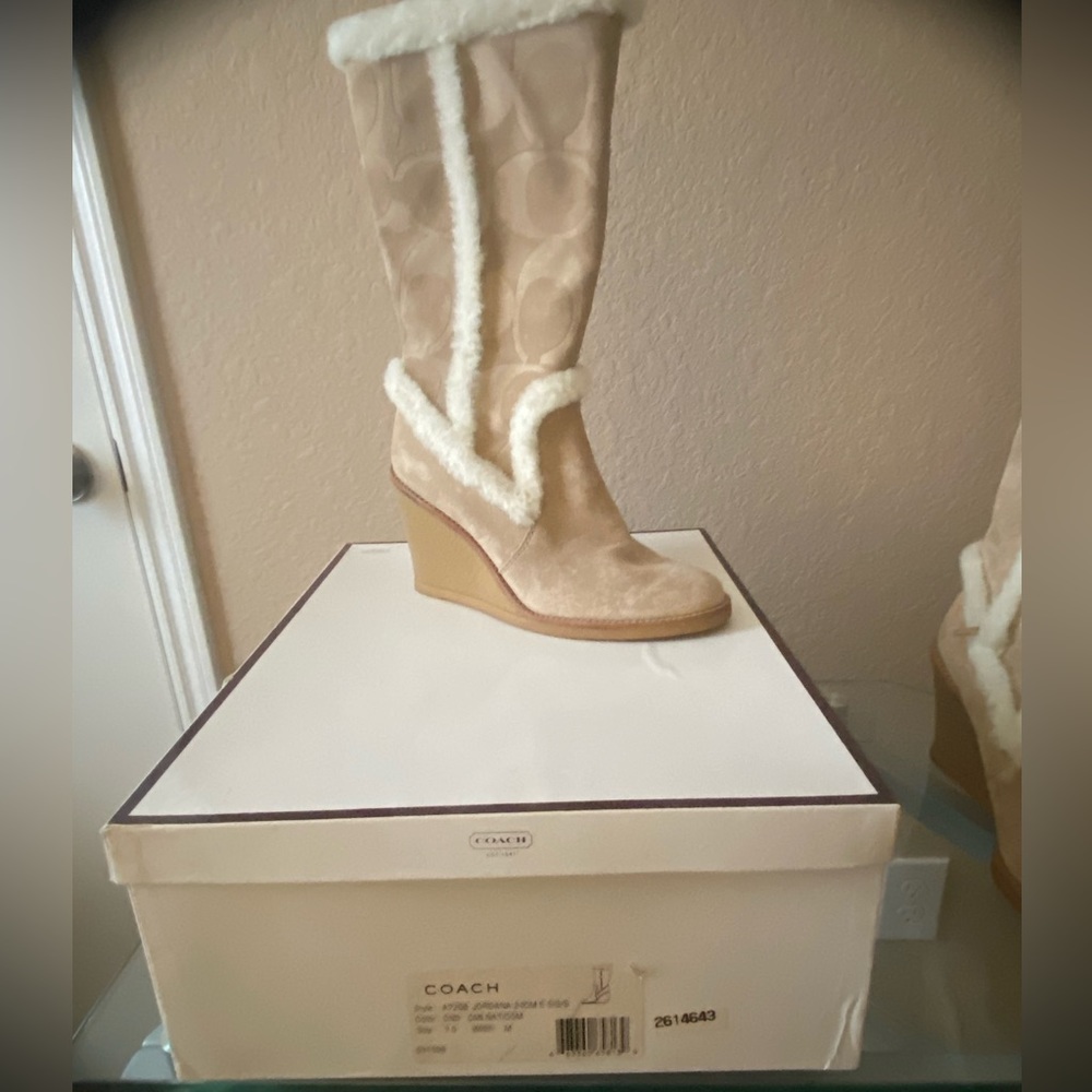 Coach boots size 7.